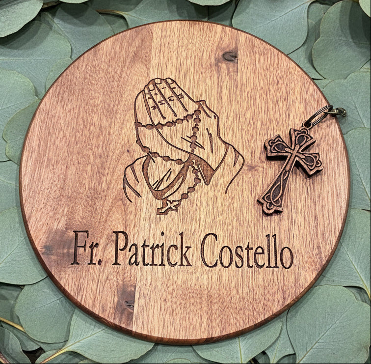 Wooden round plaque with engraved design 