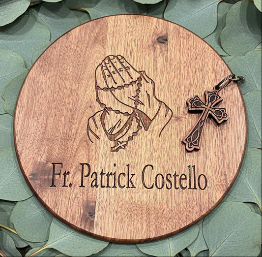 Wooden round plaque with engraved design 